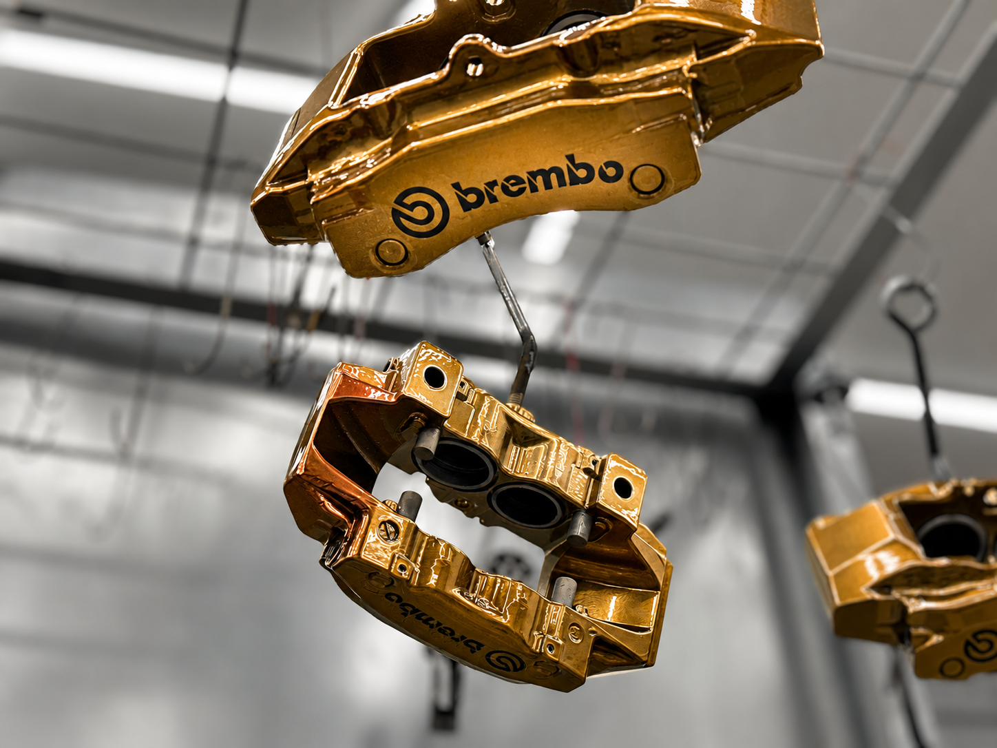 Brembo brake calipers in gold powder coat